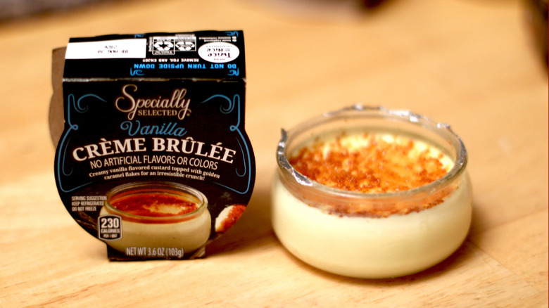 A little jar of Specially Selected brand crème Brûlée next to packaging