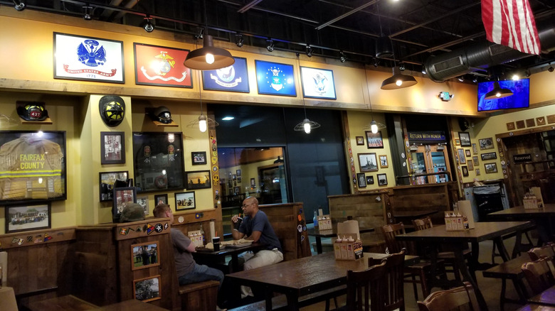 Interior of a Mission BBQ restaurant with customers seated