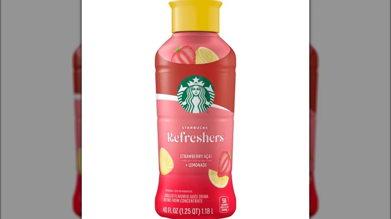 A bottle of the Starbucks Strawberry Açaí Lemonade Refresher sold in 2-packs at Costco on a white background.