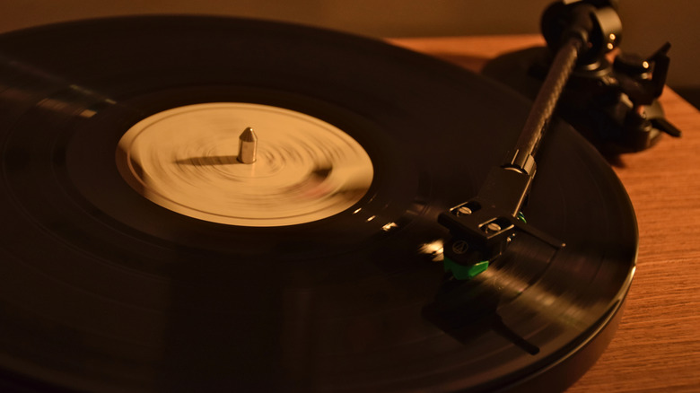 Close up of black record spinning on a turntable