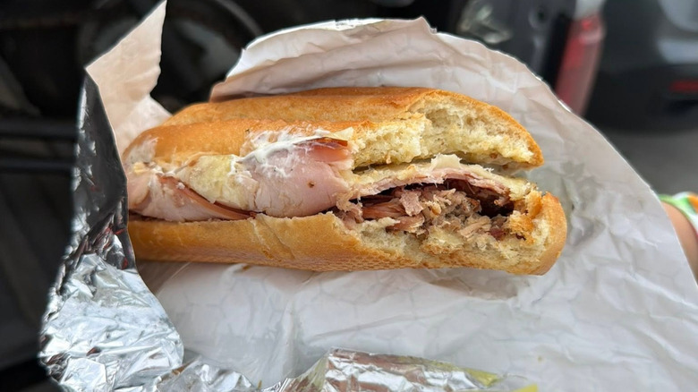 The Cuban Sandwich from Buc-ee's with a couple of bites taken out of it.