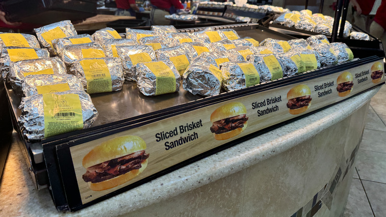 Sandwiches wrapped in foil on a Buc-ee's display