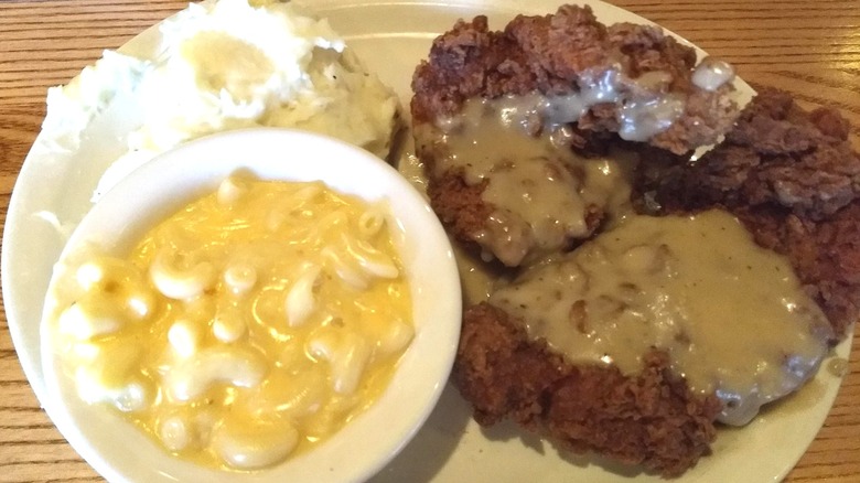 Platter of fried pork chops and sides from Cracker Barrel