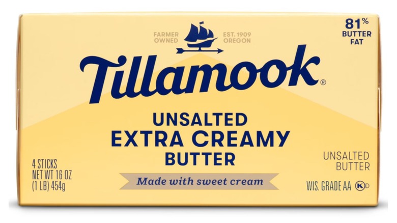 A block of Tillamook Unsalted Extra Creamy Butter pack on a white background.