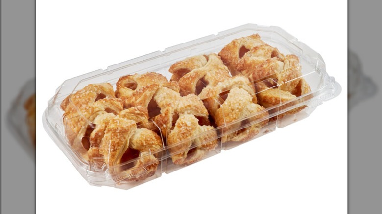 A plastic container of the Kirkland Signature Caramel Apple Strudel Bites from Costco