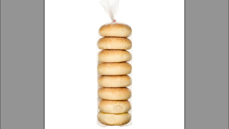 A plastic bag of the Kirkland Signature Parmesan Cheese Bagels from Costco