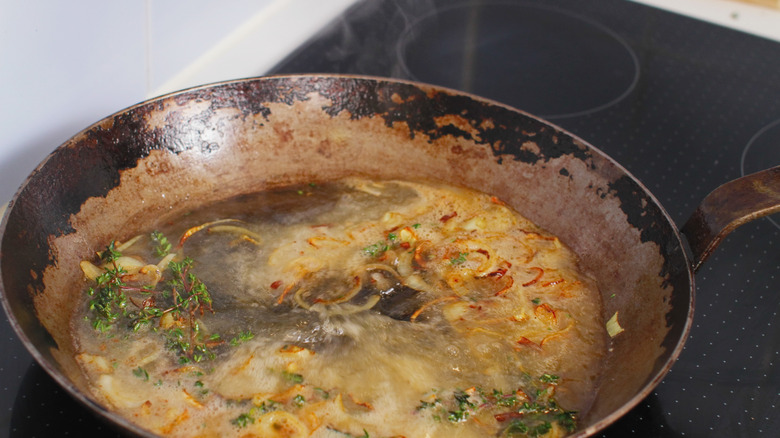 deglazing in a well-used iron grill pan