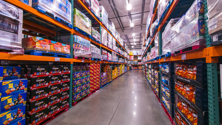 A long Costco aisle filled with snacks but no people.