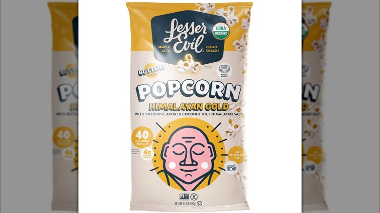 A bag of Lesser Evil Himalayan Gold Popcorn on a white background.