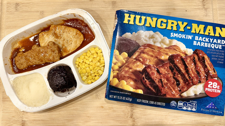 Backyard Barbeque meal in a white tray next to the packaging
