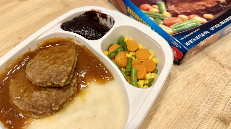 Home-Style Meatloaf in a white tray next to the packaging