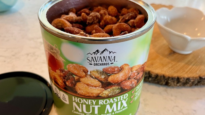An open container of Savanna Orchards honey roasted nut mix from Costco
