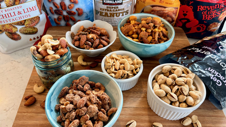 An assortment of Costco nuts in bowls on a table