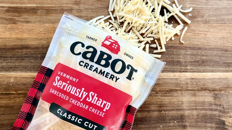 An open bag of Cabot Creamery Seriously Sharp shredded cheese