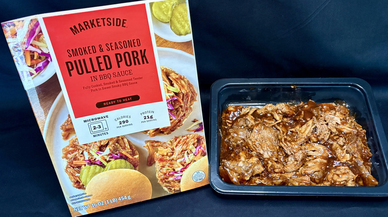 pulled pork in black container next to Marketside packaging