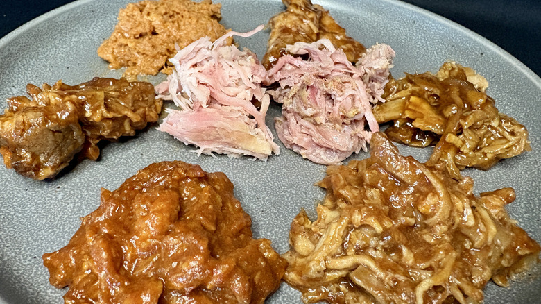 gray plate full of various pulled porks