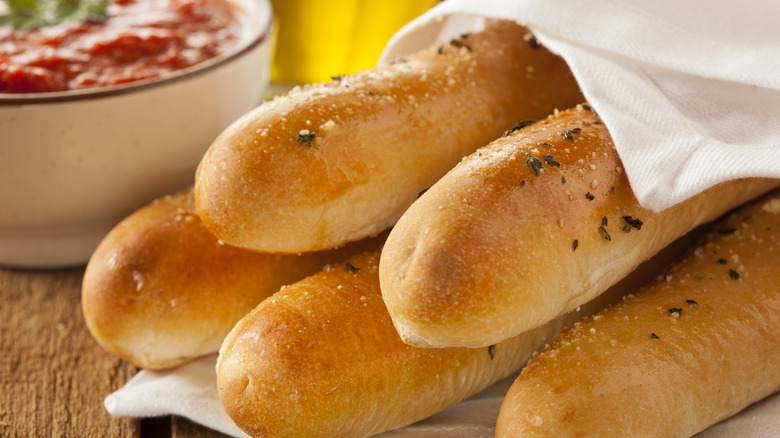 Stack of breadsticks stacked together