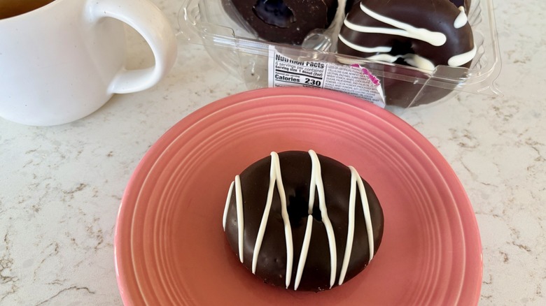 A close-up of Aldi Bake Shop chocolate dipped donuts