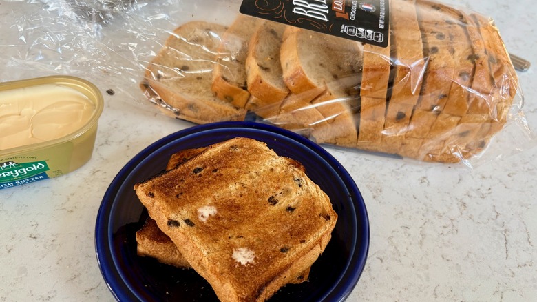 Toasted slices of Aldi's Specially Selected chocolate chip brioche with butter