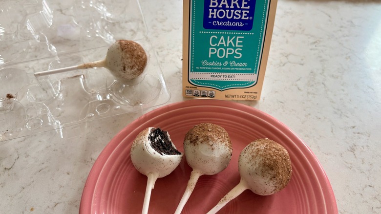 A plate of Bake House Creations Cookies & Cream cake pops from Aldi