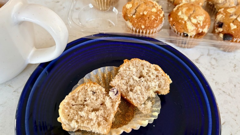 An Aldi Bake Shop mini blueberry muffin cut in half