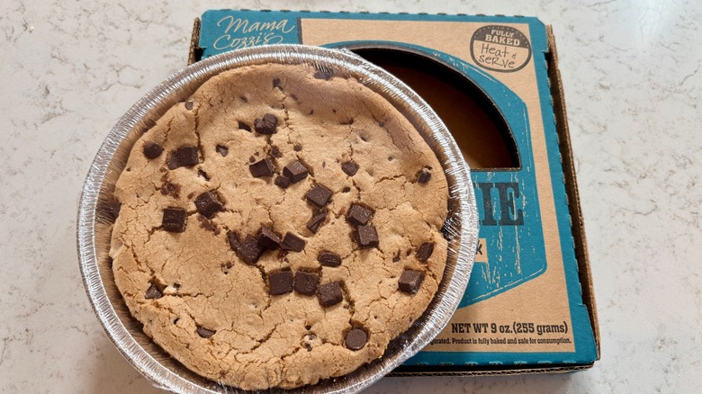 A Mama Cozzi's chocolate chunk pizza cookie out of the box