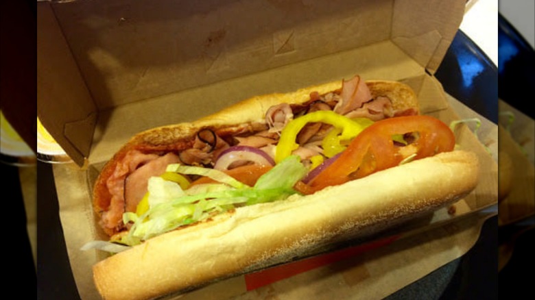 An Arby's Loaded Italian Sub in a box