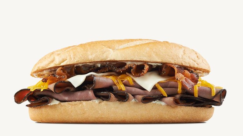 Arby's Angus Three Cheese and Bacon on white background