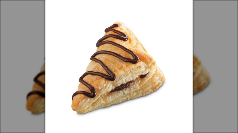 A chocolate turnover from Arby's on white background