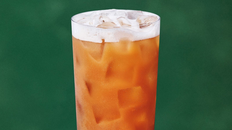 A product image of Starbucks Chaider on a forest green background.