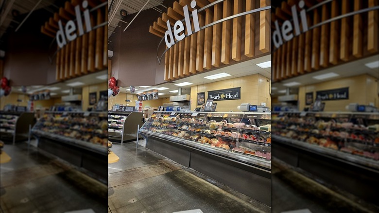 Kroger deli section with Boar's Head sign behind case of deli meats