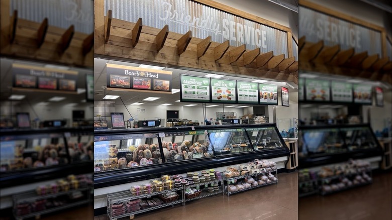 Sprouts Farmers Market Deli with case full of deli meats under Boar's Head signage and sandwich menu