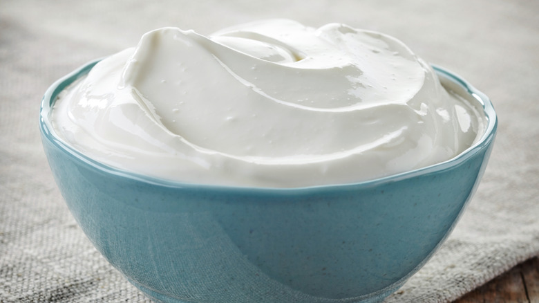 bowl of sour cream on linen napkin