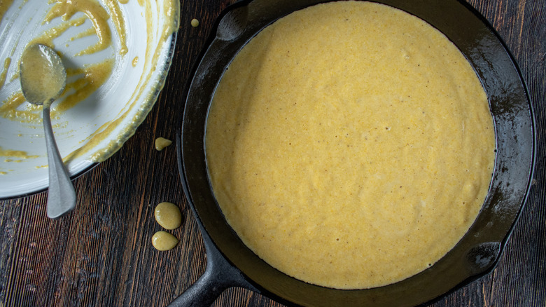 cornbread batter in cast iron pan