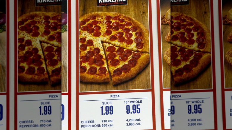 A sign advertising the Kirkland Signature Pepperoni Pizza at the Costco food court