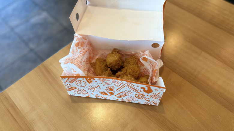 Popeyes Boneless Wings in box on a table