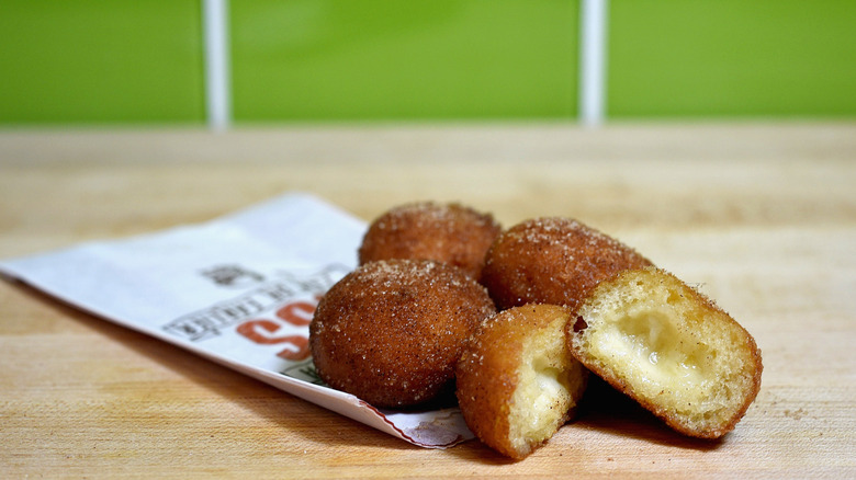 Taco Bell Cinnabon Delights on wooden table