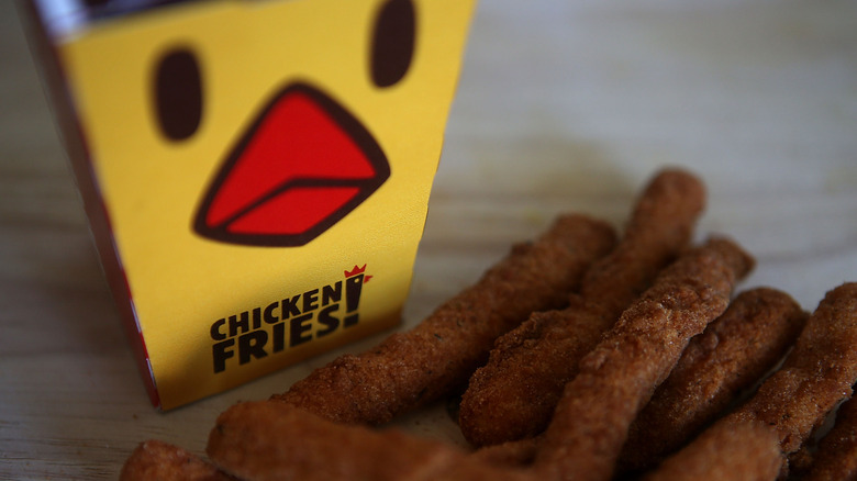 Burger King chicken fries in front of box on table