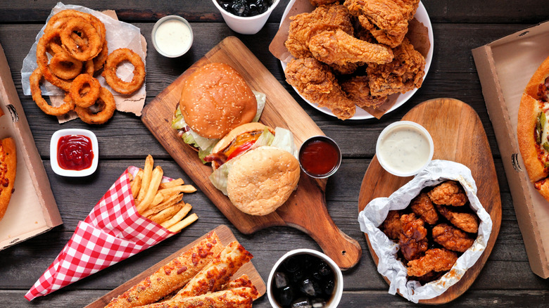 Top-down view of various food items on wooden table