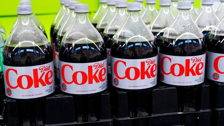 Bottles of Diet Coke on store shelf