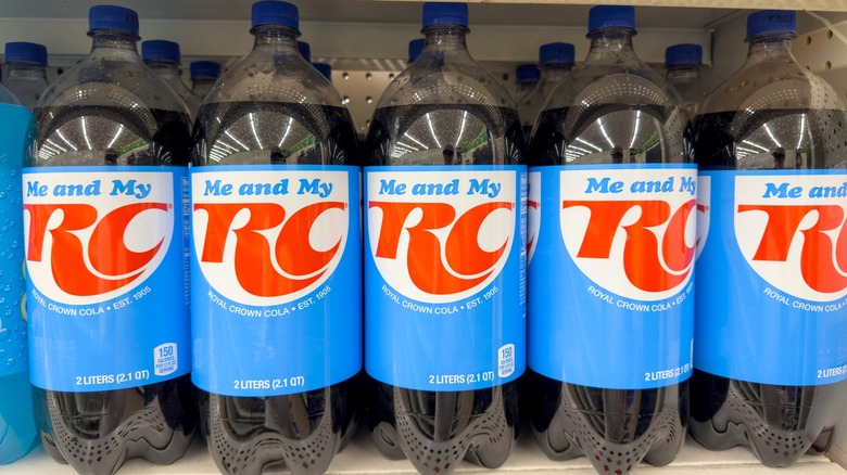 Two liter bottles of RC Cola on a store shelf