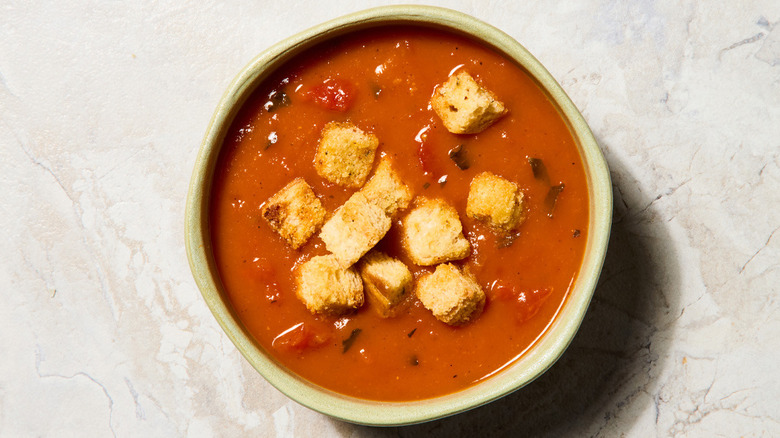 The Roasted Tomato Basil Soup from Corner Bakery Cafe with croutons on top