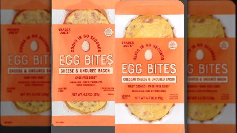 Trader Joe's Cheddar Cheese & Uncured Bacon Egg Bites on a dark background.