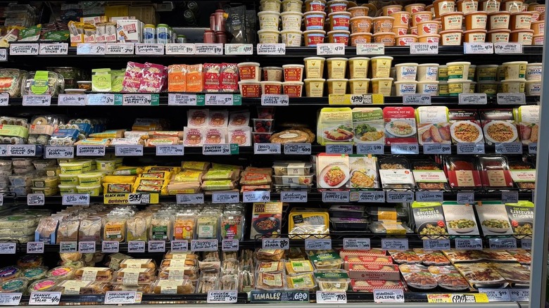 The refrigerated section at Trader Joe's full of various grab and go foods.