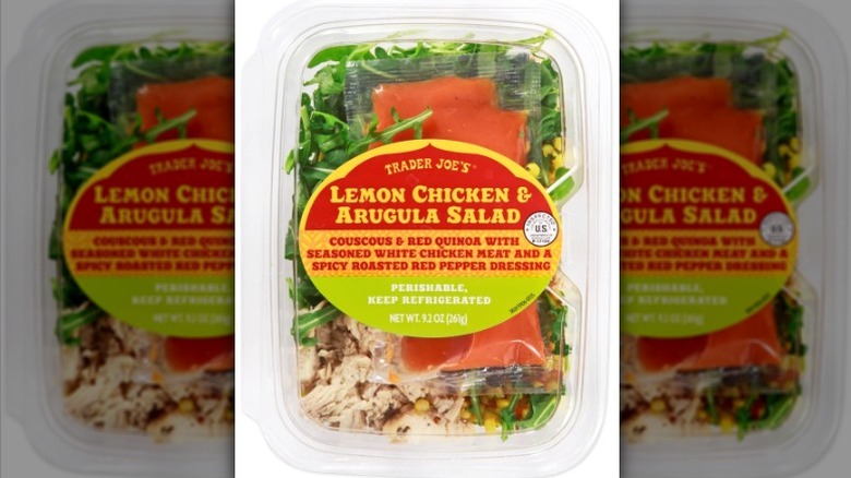 Trader Joe's Lemon Chicken & Arugula Salad on a white background.