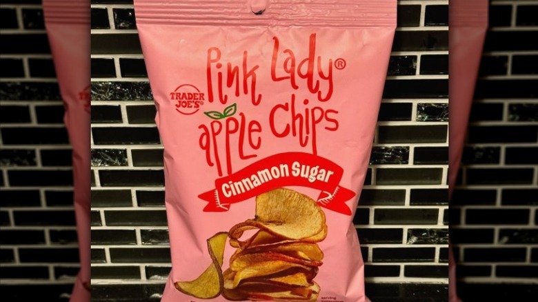 A bag of Trader Joe's Pink Lady Apple Chips.