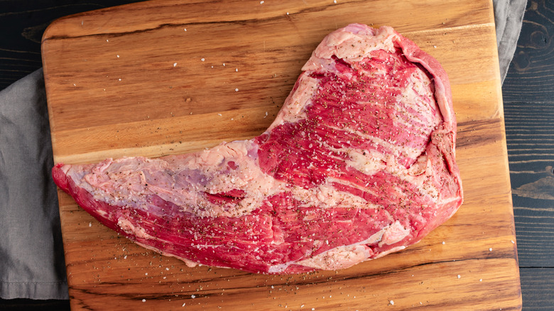 Raw tri tip on board