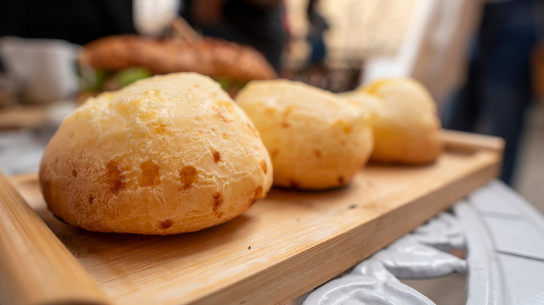 Pão de queijo (Brazilian cheese bread) on a wooden table