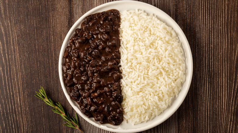 A plate with black beans and white rice