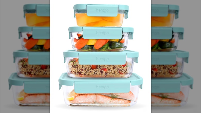 Bentgo Leak-Proof Borosilicate Glass food storage containers with light blue lids stacked on top of each other with food inside